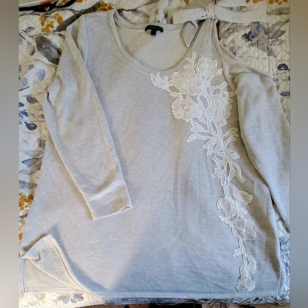 Off the shoulder light sweater